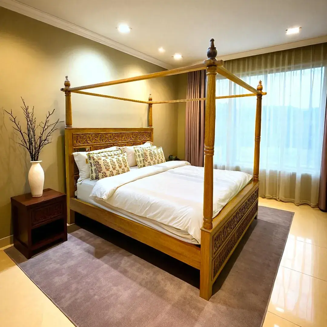 The Maharaja Carved Canopy Bed