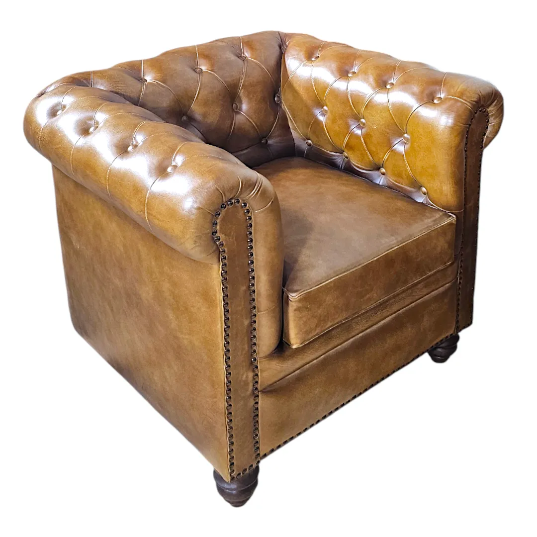 Fauteuil Capitonnage Cognac (The Cognac Tufted Armchair)