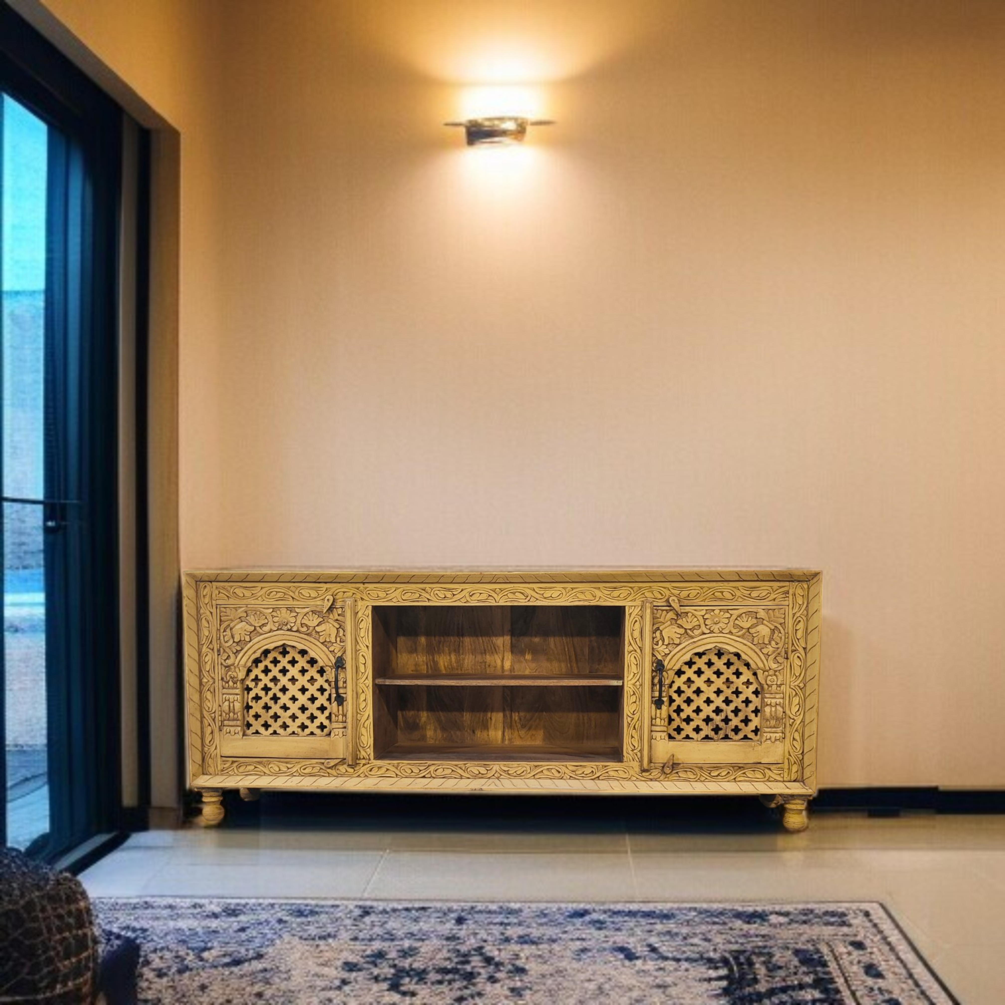 TV bench with intricate hand-carving, natural finish
